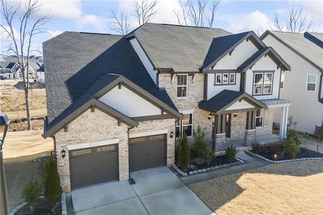 view of front of house with concrete driveway, roof with shingles, an attached garage, a porch, and brick siding