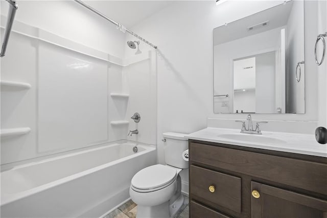 full bathroom featuring vanity, bathtub / shower combination, and toilet