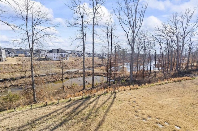 view of yard with a water view