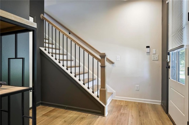 126 Chestnut Cir, Atlanta, GA 30342 - foyer featuring wood finished floors, stairway, baseboards, and a high ceiling