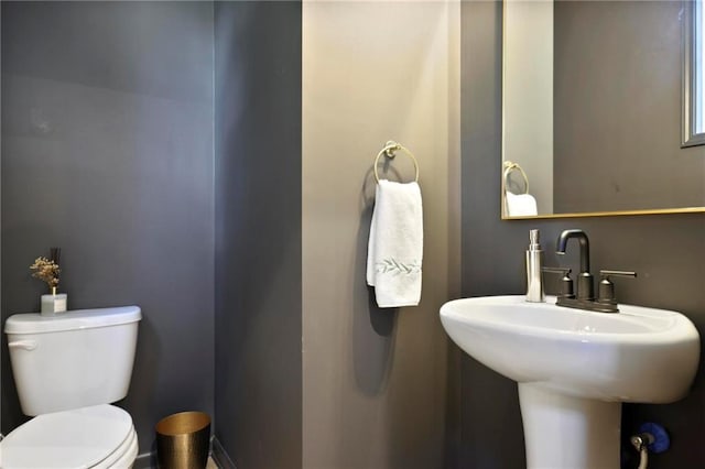 126 Chestnut Cir, Atlanta, GA 30342 - bathroom featuring toilet and a sink