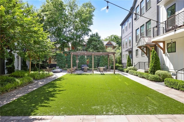 126 Chestnut Cir, Atlanta, GA 30342 - view of property's community with a pergola, a patio area, and a lawn
