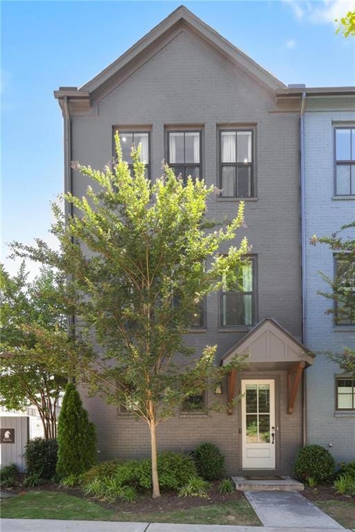126 Chestnut Cir, Atlanta, GA 30342 - view of property featuring brick siding