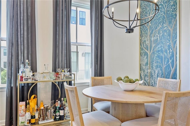 126 Chestnut Cir, Atlanta, GA 30342 - dining room with a chandelier and baseboards