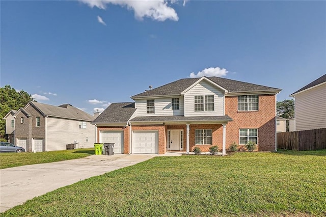 view of property with central AC and a front lawn