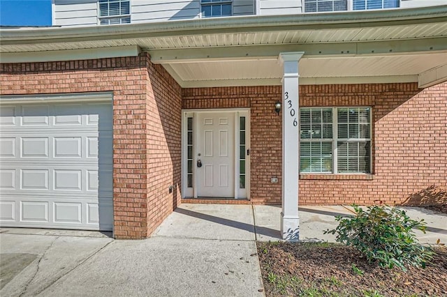 doorway to property featuring a porch