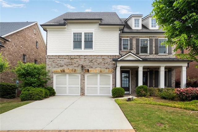 4884 Kentwood Dr, Marietta, GA 30068 - craftsman house with a garage, covered porch, a front yard, brick siding, and concrete driveway