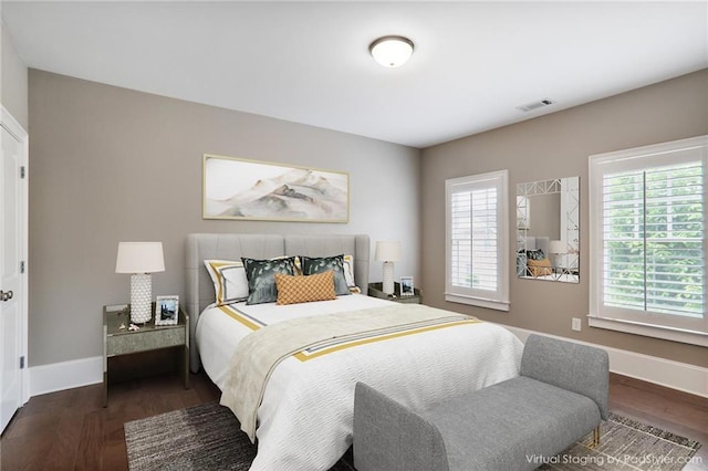 4884 Kentwood Dr, Marietta, GA 30068 - bedroom with visible vents, baseboards, and wood finished floors