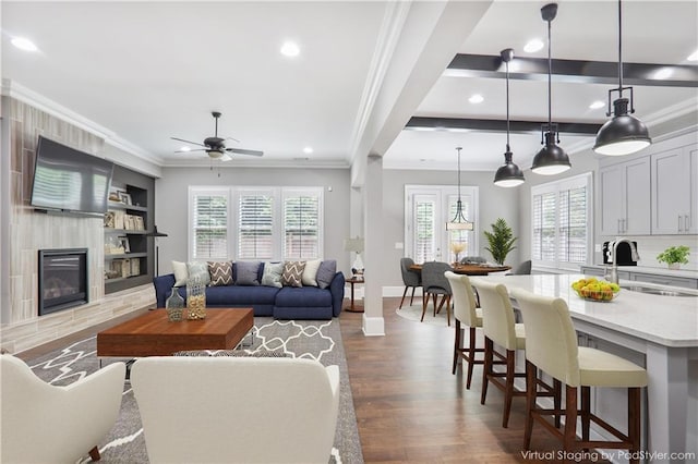 4884 Kentwood Dr, Marietta, GA 30068 - living area featuring ornamental molding, a ceiling fan, recessed lighting, and dark wood-type flooring