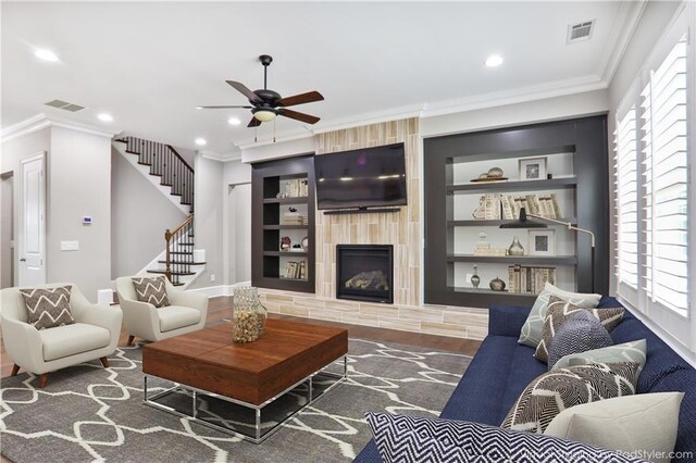 4884 Kentwood Dr, Marietta, GA 30068 - living area featuring visible vents, crown molding, and ceiling fan