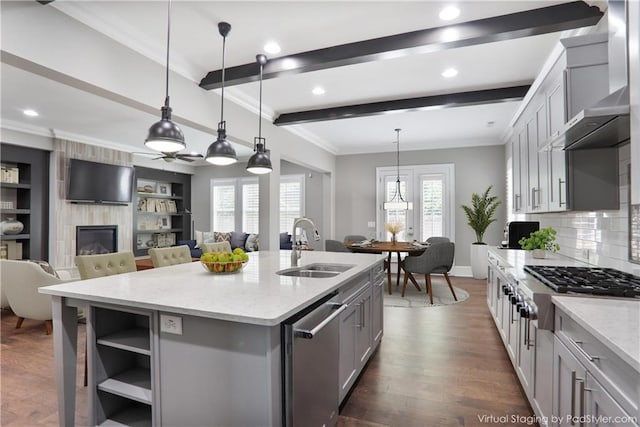4884 Kentwood Dr, Marietta, GA 30068 - kitchen with wall chimney range hood, open shelves, a sink, beamed ceiling, and stainless steel appliances