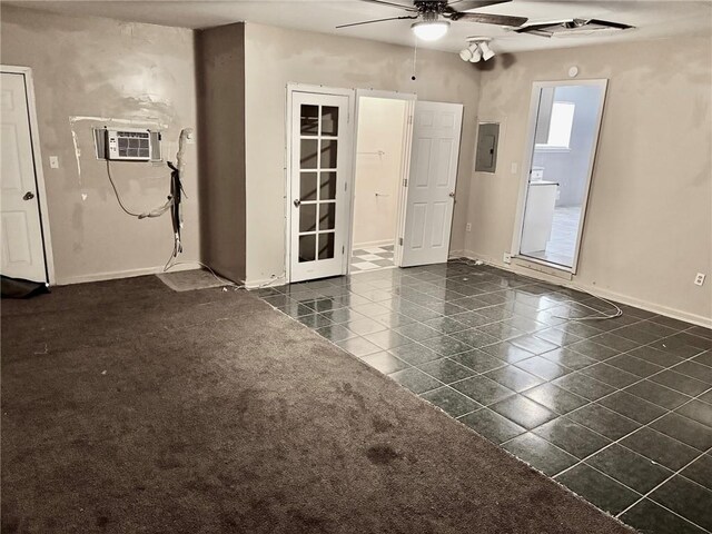 unfurnished room with ceiling fan, carpet, and a textured ceiling