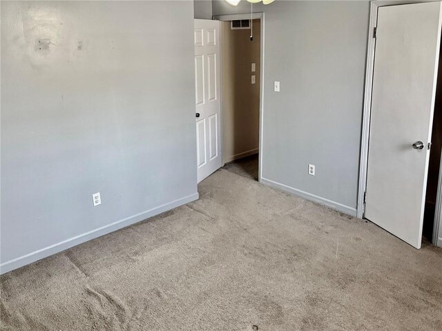 living room with ceiling fan, a wall mounted AC, and electric panel