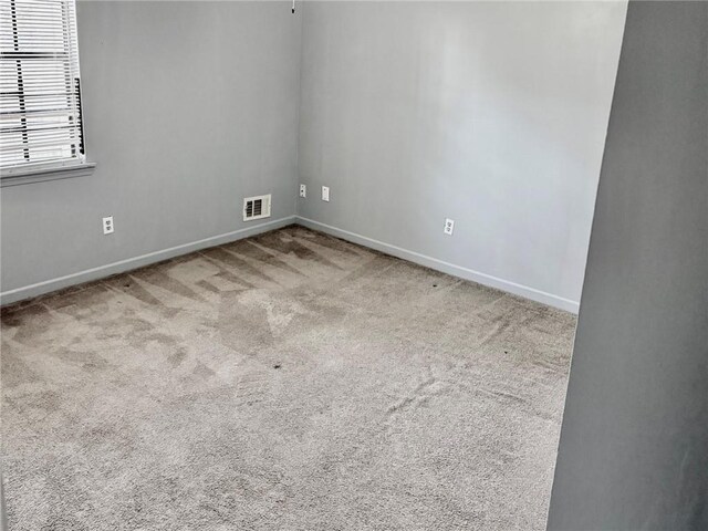 utility room with water heater