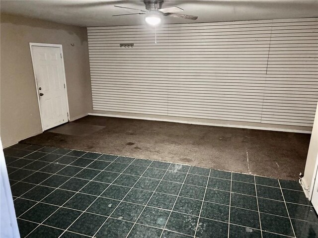 bathroom with tile patterned floors, vanity, toilet, and a shower