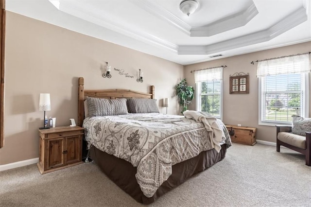 242 Sandhurst Ct, Suwanee, GA 30024 - carpeted bedroom featuring crown molding, a raised ceiling, and baseboards