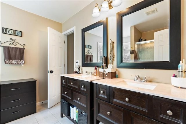 242 Sandhurst Ct, Suwanee, GA 30024 - full bath with vanity, tile patterned flooring, a shower with shower door, and baseboards