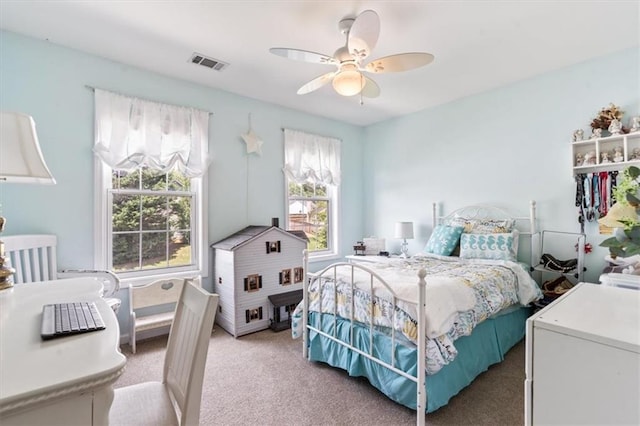 242 Sandhurst Ct, Suwanee, GA 30024 - bedroom with light colored carpet and ceiling fan