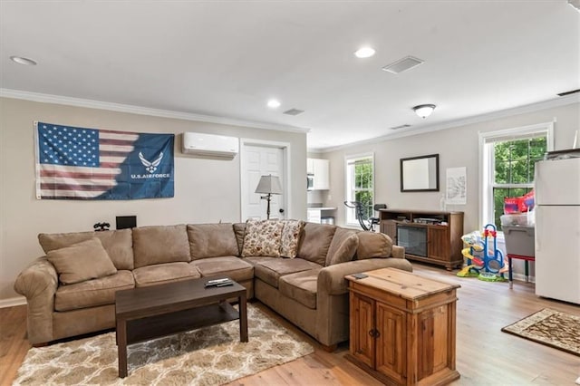 242 Sandhurst Ct, Suwanee, GA 30024 - living room with an AC wall unit, ornamental molding, healthy amount of natural light, light wood-style flooring, and recessed lighting