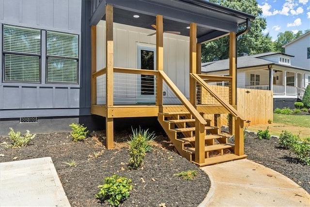 entrance to property featuring ceiling fan