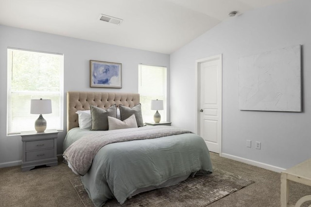 bedroom featuring carpet, vaulted ceiling, and baseboards