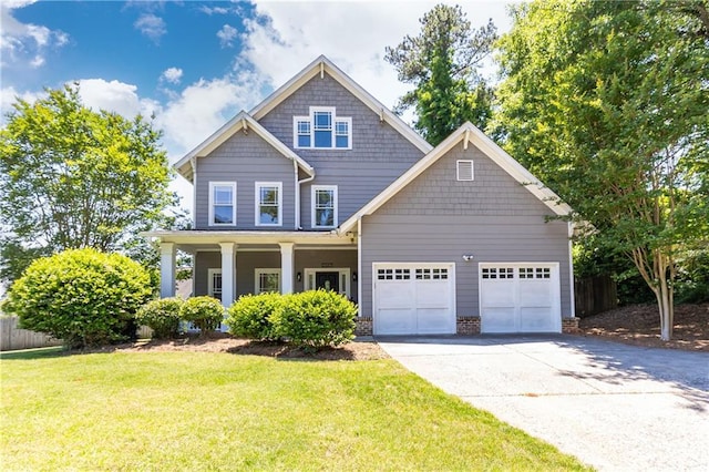 2167 Tilson Rd, Decatur, GA 30032 - craftsman house with an attached garage, driveway, and a porch