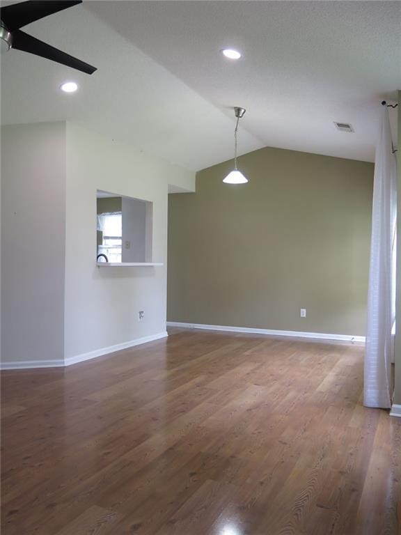4517 Baker Grove Rd NW, Acworth, GA 30101 - spare room with baseboards, wood finished floors, lofted ceiling, and recessed lighting