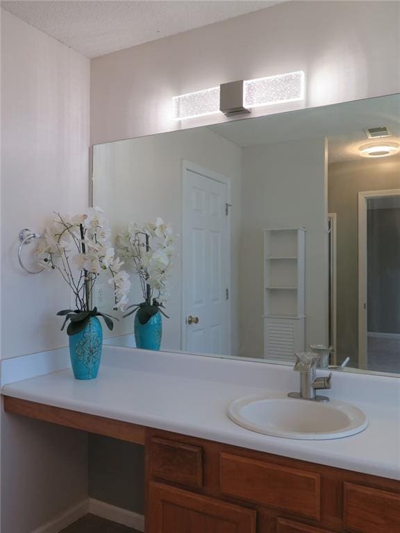 4517 Baker Grove Rd NW, Acworth, GA 30101 - bathroom with vanity and a textured ceiling