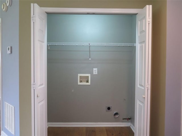 4517 Baker Grove Rd NW, Acworth, GA 30101 - washroom with electric dryer hookup, hookup for a washing machine, wood finished floors, gas dryer hookup, and baseboards
