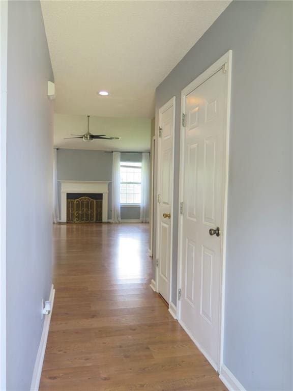4517 Baker Grove Rd NW, Acworth, GA 30101 - hall featuring baseboards, wood finished floors, and recessed lighting