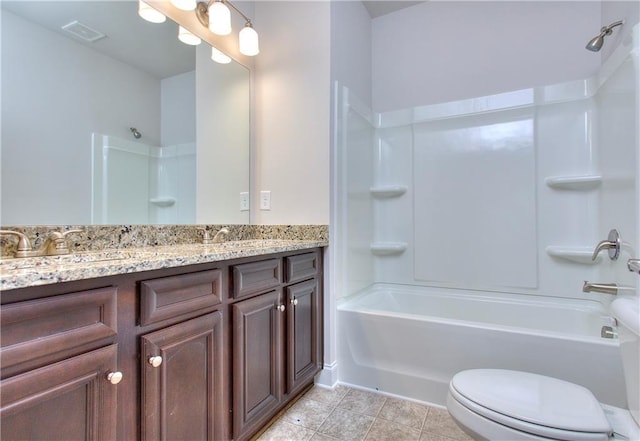 full bathroom featuring toilet, shower / bathing tub combination, tile patterned flooring, and vanity