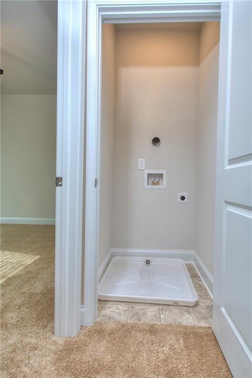 laundry area with washer hookup, light colored carpet, and hookup for an electric dryer