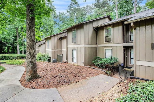 8740 Roswell Rd Unit 2G, Atlanta, GA 30350 - view of property exterior featuring central AC