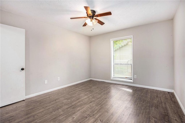 8740 Roswell Rd Unit 2G, Atlanta, GA 30350 - spare room with wood finished floors, ceiling fan, and baseboards