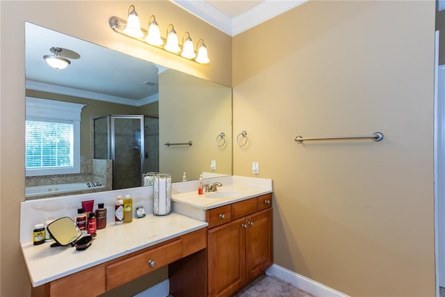 bathroom with vanity, crown molding, and separate shower and tub