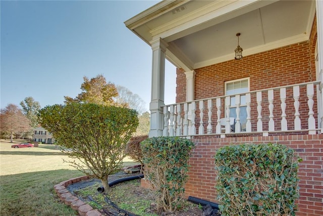 view of property exterior featuring a yard and a porch