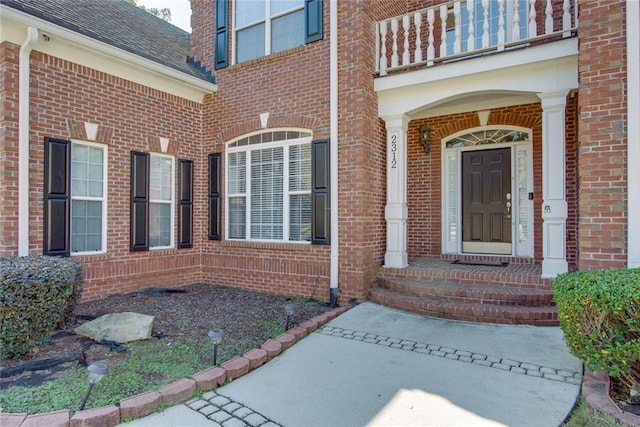 doorway to property featuring a balcony