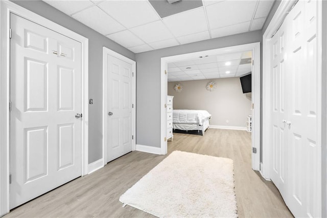 253 Grindstone Creek Dr, Clarkesville, GA 30523 - bedroom with a drop ceiling, baseboards, and light wood-style flooring
