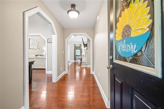 253 Grindstone Creek Dr, Clarkesville, GA 30523 - foyer entrance with wood finished floors, arched walkways, and baseboards
