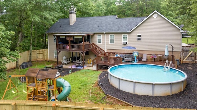 253 Grindstone Creek Dr, Clarkesville, GA 30523 - view of pool with a wooden deck, a playground, stairway, and a patio area