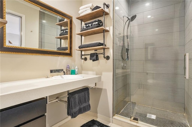 full bath with a stall shower and tile patterned flooring