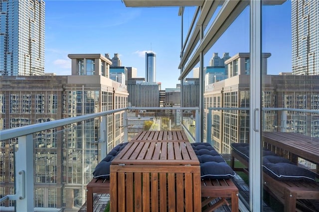 balcony featuring a city view