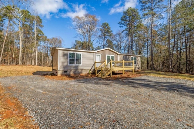 manufactured / mobile home featuring a deck