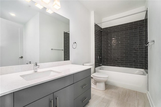 full bathroom featuring toilet, vanity, and shower / tub combination