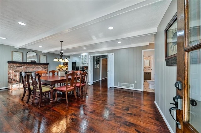 2057 High Shoals Rd, Dallas, GA 30132 - dining room featuring beam ceiling, wood finished floors, a chandelier, and recessed lighting