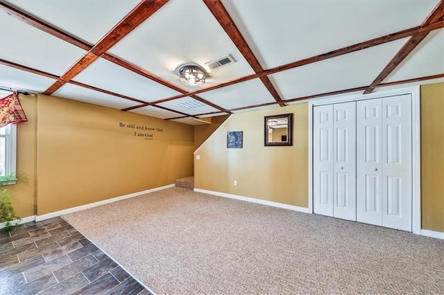 2057 High Shoals Rd, Dallas, GA 30132 - unfurnished living room featuring coffered ceiling, beam ceiling, and dark carpet