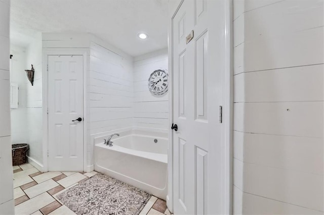 2057 High Shoals Rd, Dallas, GA 30132 - full bathroom featuring a garden tub and recessed lighting