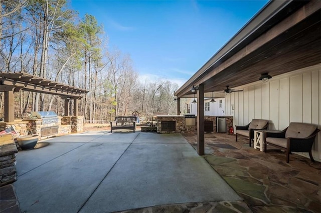 2057 High Shoals Rd, Dallas, GA 30132 - view of patio featuring exterior kitchen, a ceiling fan, and a pergola