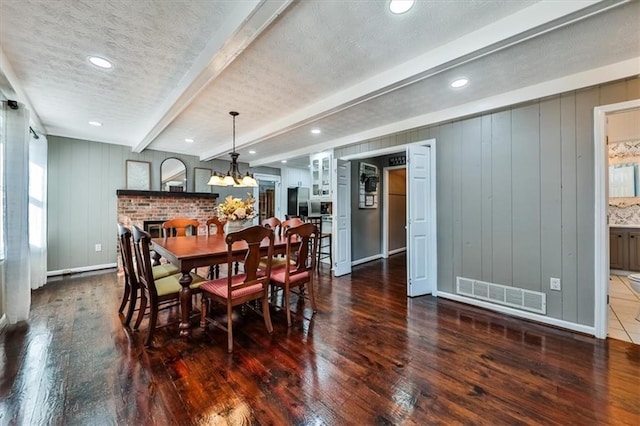 2057 High Shoals Rd, Dallas, GA 30132 - dining room with hardwood / wood-style flooring, beamed ceiling, recessed lighting, a chandelier, and a textured ceiling