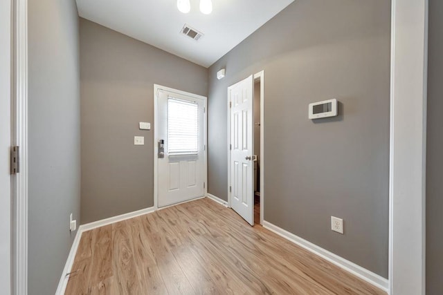 entrance foyer with light hardwood / wood-style flooring